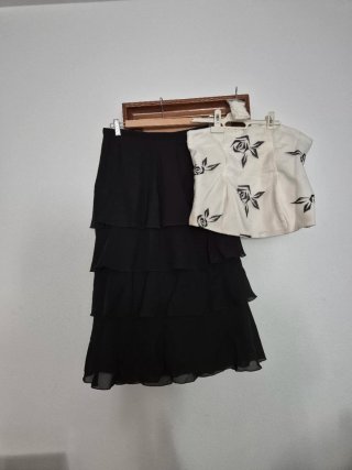 Conjunto de Falda y Corpiño 42. 39 euros