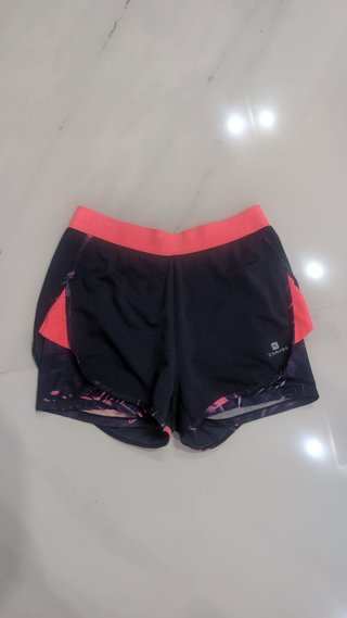 Pantalones deportivos cortos Domyos