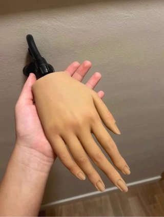 Mano de maniquí articulada