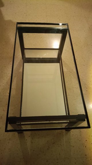 Mesa de centro elevable de cristal y metal