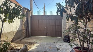 Portón de jardín de hierro de doble hoja