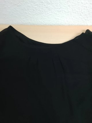Blusón negro con  una capa debajo de Nilo muy suav