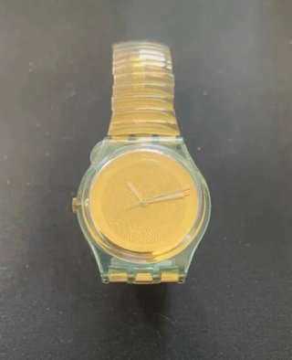 Reloj Swatch Dorado
