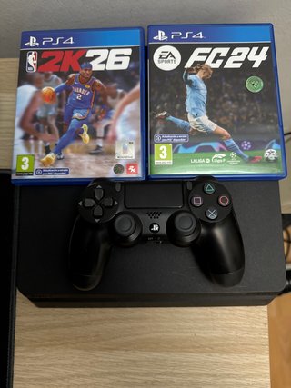 PS4 negra slim con juegos Precio negociable