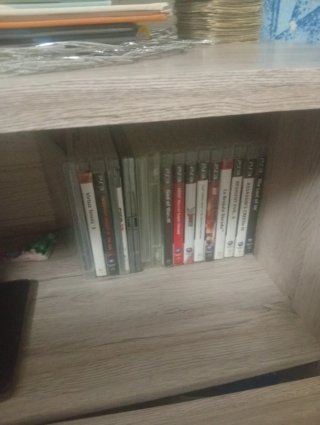 PlayStation 3 (PS3) con mandos y juegos