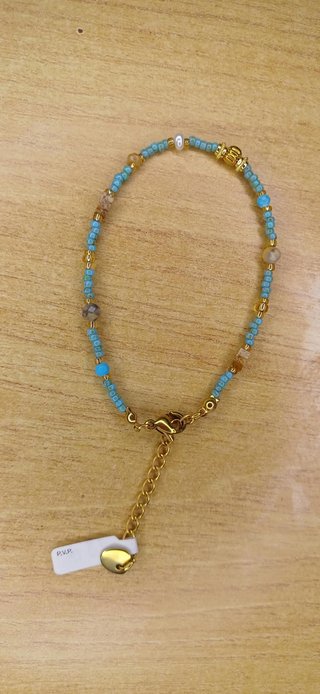 Pulsera de cuentas turquesas y doradas