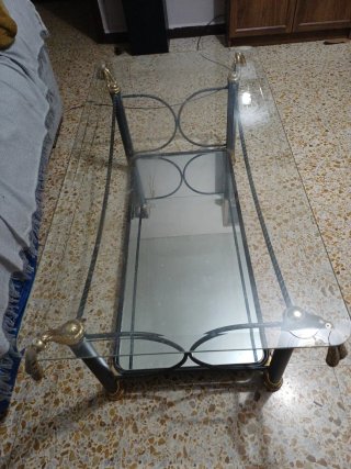 Mesa de centro de cristal y metal