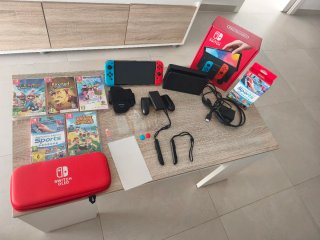 Nintendo Switch OLED con juegos y accesorios