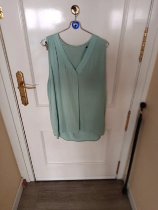 Blusa sin mangas turquesa