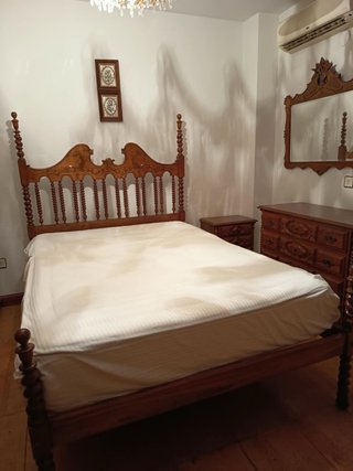 Dormitorio de Madera Tallada
