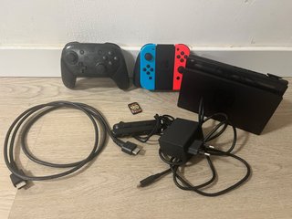Nintendo Switch + Mando Pro Oficial + tarjeta mig