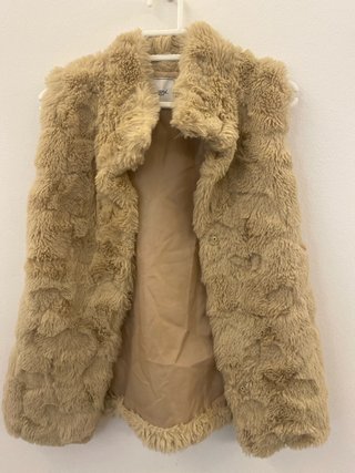 Chaleco de pelo sintético beige talla 10 años