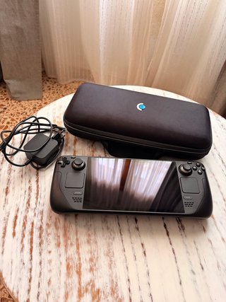 Console Steam Deck portatile quasi nuova senza graffi, con custodia e caricatore originali