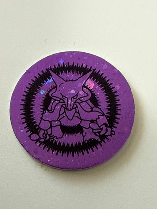 Moneda Pokémon Alakazam Morada (2000)