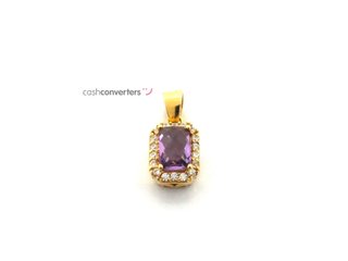 colgante oro 18k con piedra con circonita,cuarzo