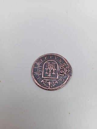 Moneda antigua de cobre