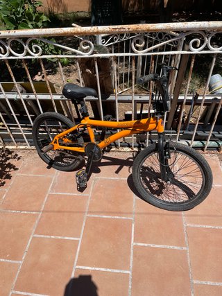 Bicicleta BMX naranja rueda 20 pulgadas