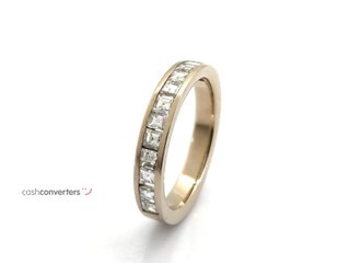 alianza oro 18k con piedra con diamante