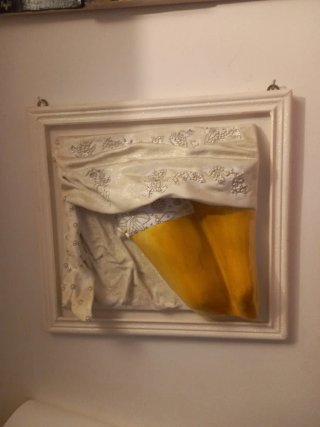 Scultura in gesso da parete