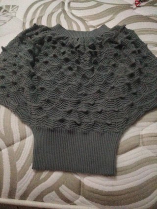 Chaleco de punto gris corto