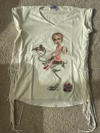 Camiseta Lola Casademunt con flecos
