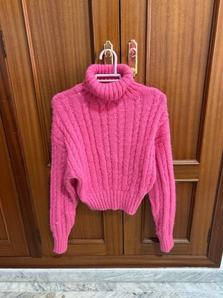 Jersey de cuello alto rosa