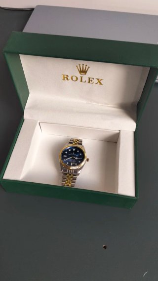 Reloj Rolex Submariner Azul y Oro