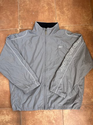 Cortavientos Reebok Gris Talla S
