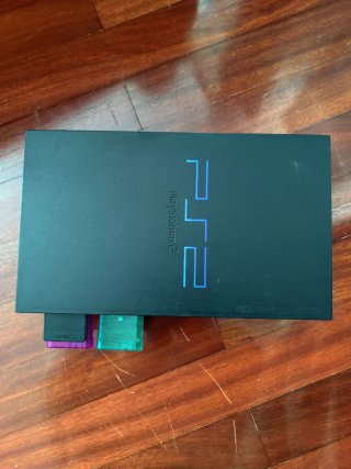 Consola PlayStation 2 (PS2) Sony con juegos mandos