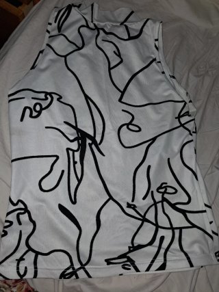 Blusa sin mangas con estampado queda a talla M