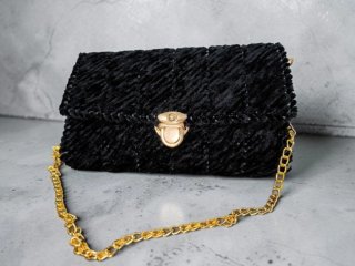 Cartera de mano artesanal negra