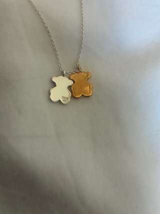 Colgante Tous plata con dos osos sin usar .