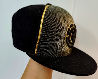 Gorra Element Negra y Dorada