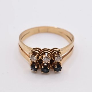 Anillo de oro 18k con piedras bicolor