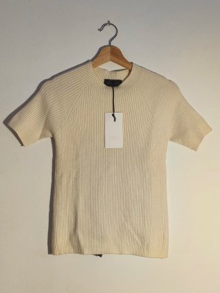 Top de Zara de punto con lazo en la espalda