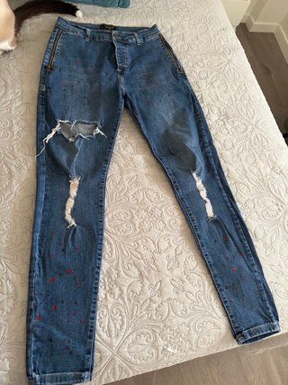 Vaqueros Siksilk con rotos