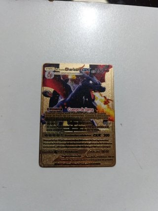 Carta Pokémon Metálica Charizard GX Dorada