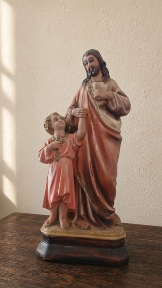 Antigua figura religiosa de San José con el Niño