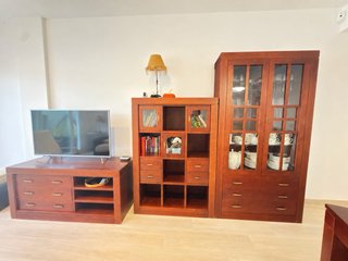 Salón completo de madera y sofá cama