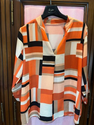 Blusa de cuadros naranja