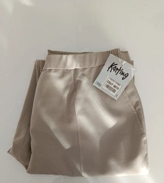 Pantalones Beige Karting. tallan pequeño