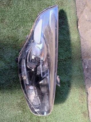 FARO IZQUIERDO Kia Carens (RP)(2013->)