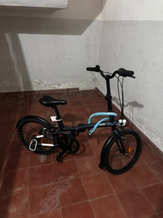 Bicicleta Plegable Btwin Decathlon con candado