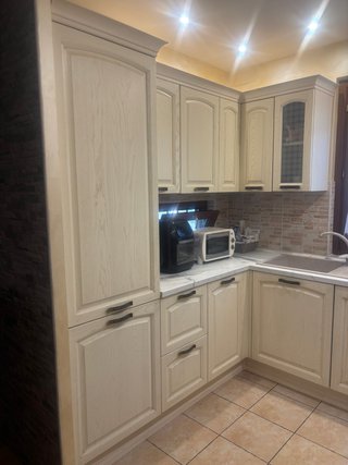 Cucina angolare in legno beige