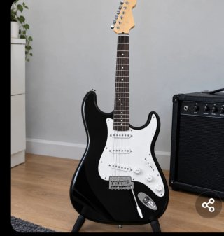 Guitarra Eléctrica Negra con Amplificador.