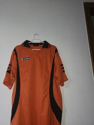 Camiseta Lotto Naranja y Negra