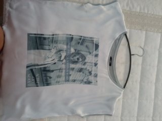 Blusa sin mangas blanca TEX