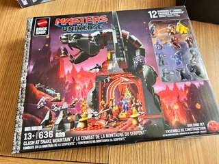 Set Mattel Brick Shop: Clash at Snake Mountain