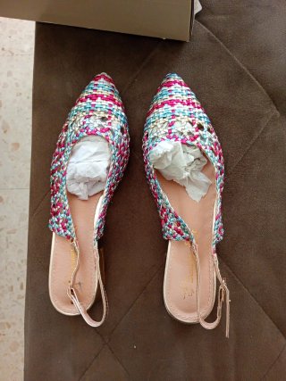 Zapatos de señora trenzados