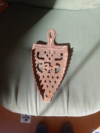 Reposa planchas antiguo de hierro